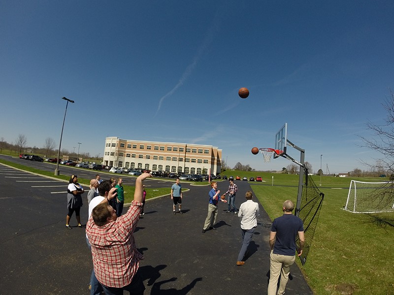 RevLocal employees playing basketball